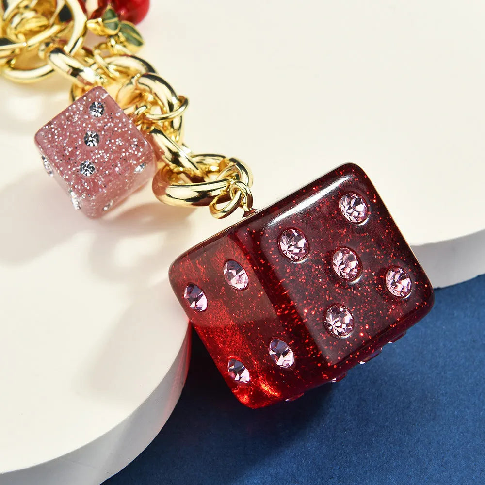 Square metal dice keychain pendant with cherry electroplated finish and keychain attachment