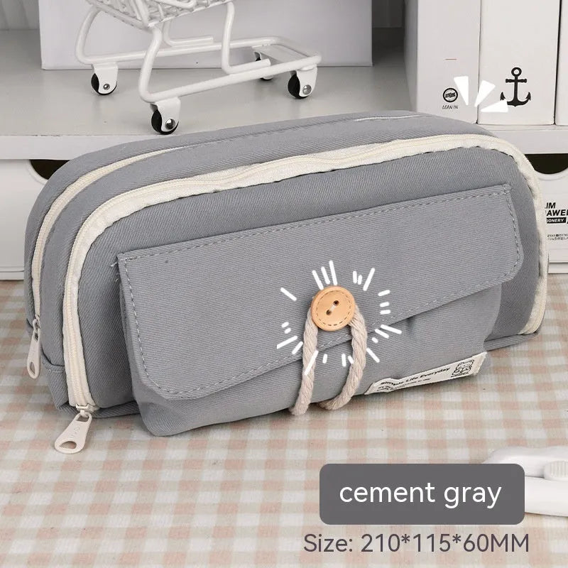 Korean style canvas pencil case in green holding multiple pens