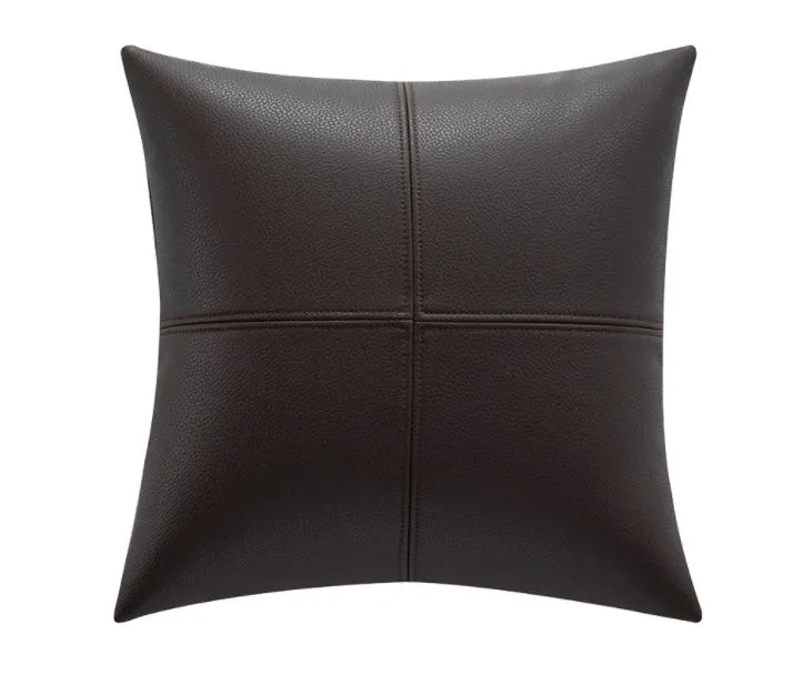 Solid colour soft cowhide leather pillow cover in Nordic style on a grey sofa.