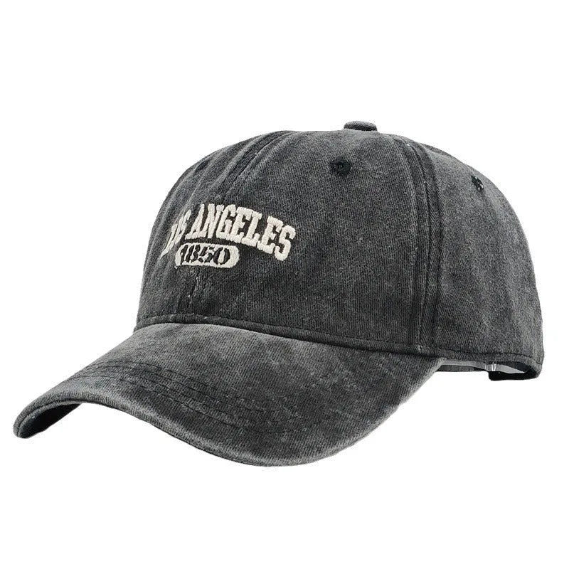 Personalised embroidered retro-style peaked cap in distressed beige with adjustable strap