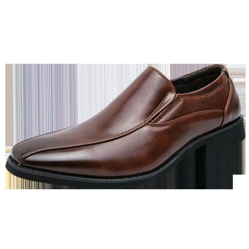 Men's black pointed casual shoes with a patent leather look and flat rubber sole.