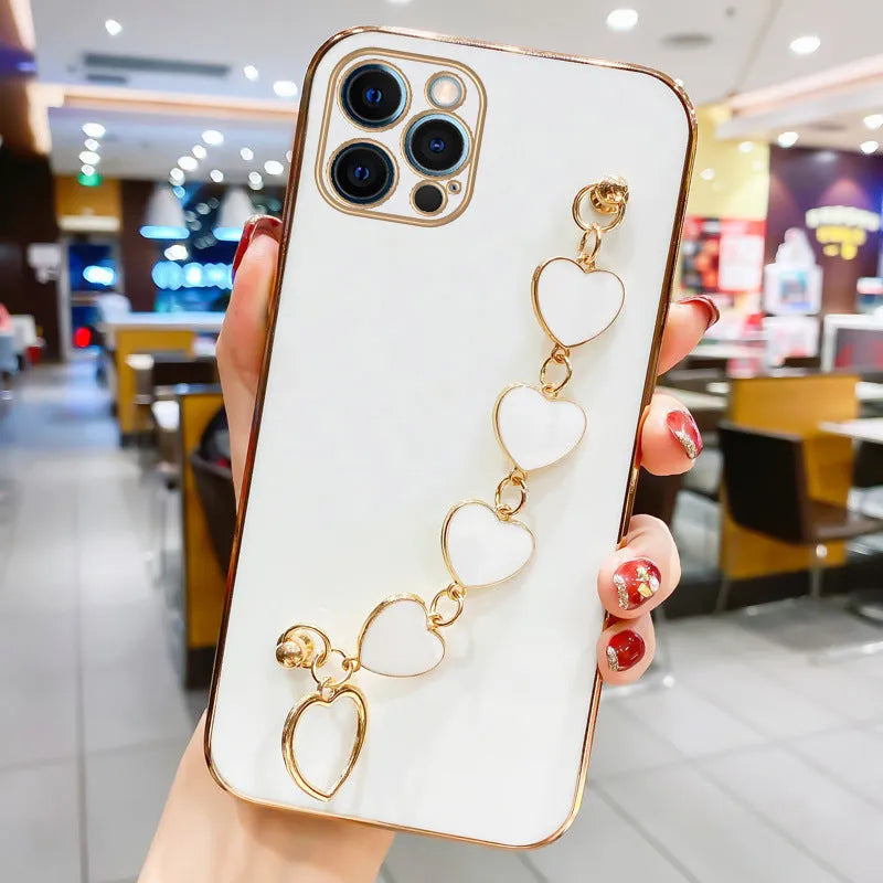 Soft silicone phone case for iPhone with rhinestone electroplate design and lanyard chain for shockproof protection