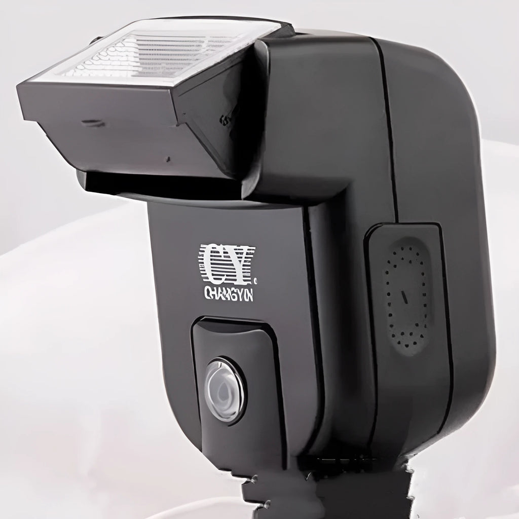 SLR camera flash accessory with upward tilt feature showing compact design and hot shoe mount