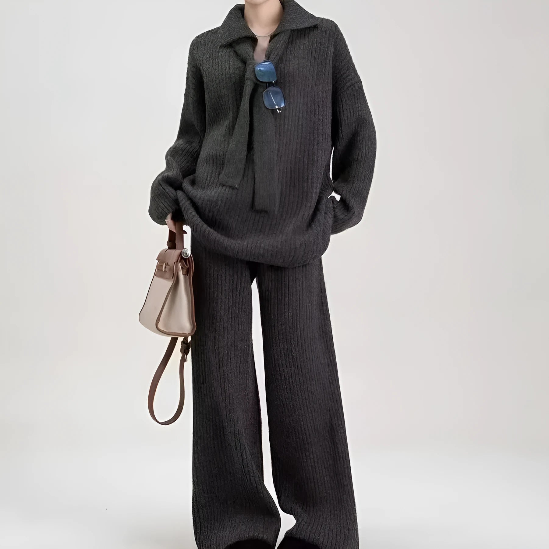 Women's knitted sweater suit two-piece set with top and trousers in neutral colours