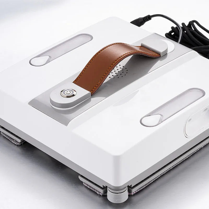 White intelligent window cleaning robot for automated washing of high-rise windows.
