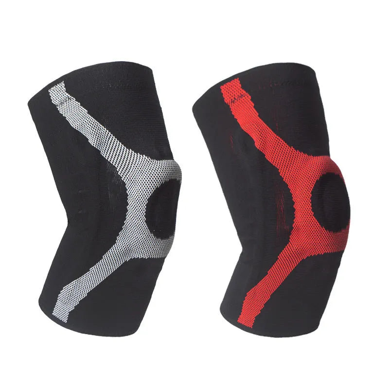 Knitted non-slip sports knee pads in red and grey, showing silicone protective section on knee.