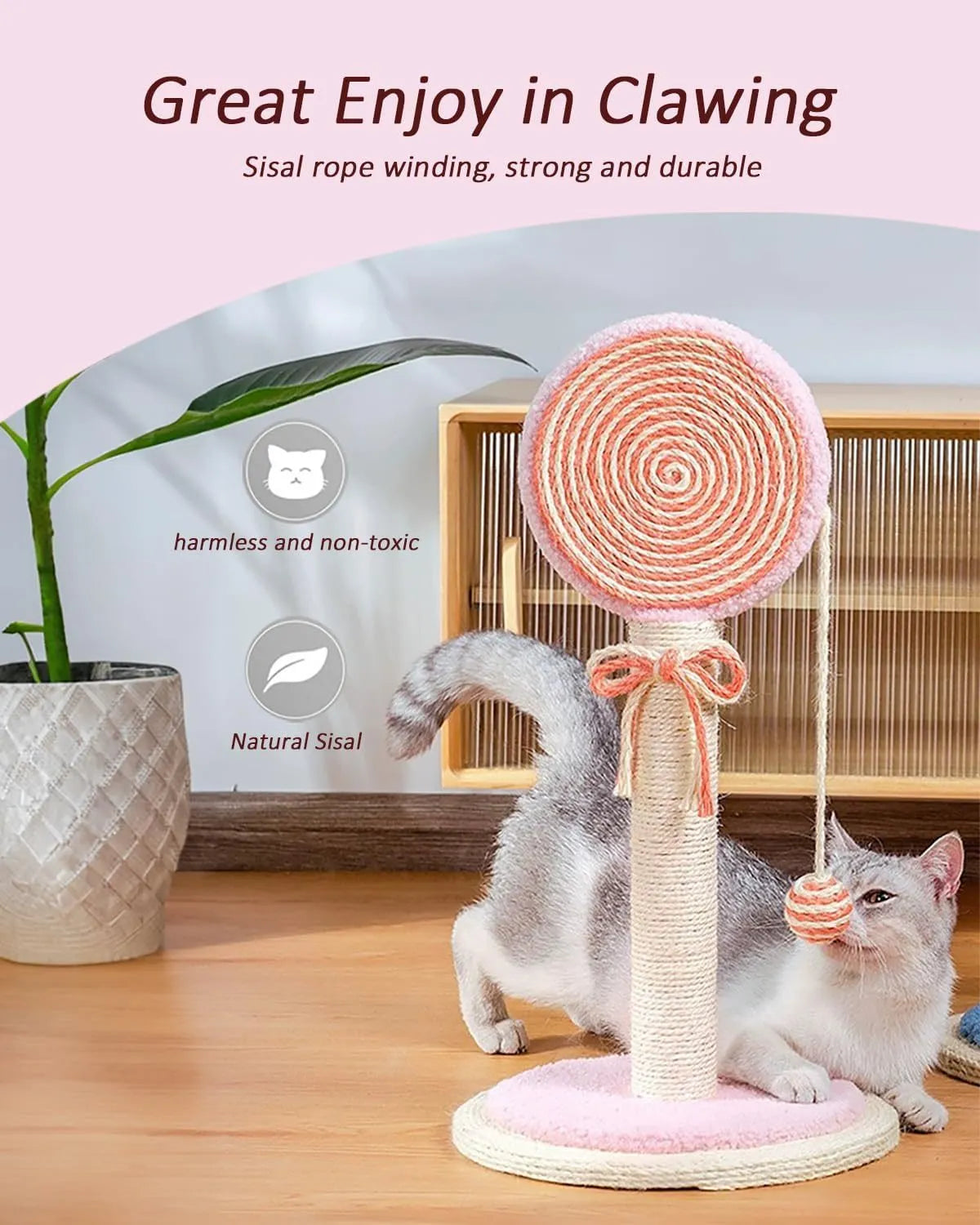 Cat scratching post with sisal rope surface and hanging ball toy on sturdy wood base