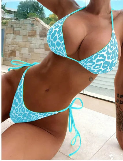 Women's lace-up triangle bikini top with matching split-leg bottoms in a colour style.