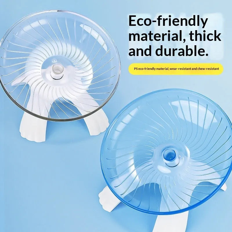 Plastic hamster running wheel in white with frisbee shape and no-stick foot surface for exercise