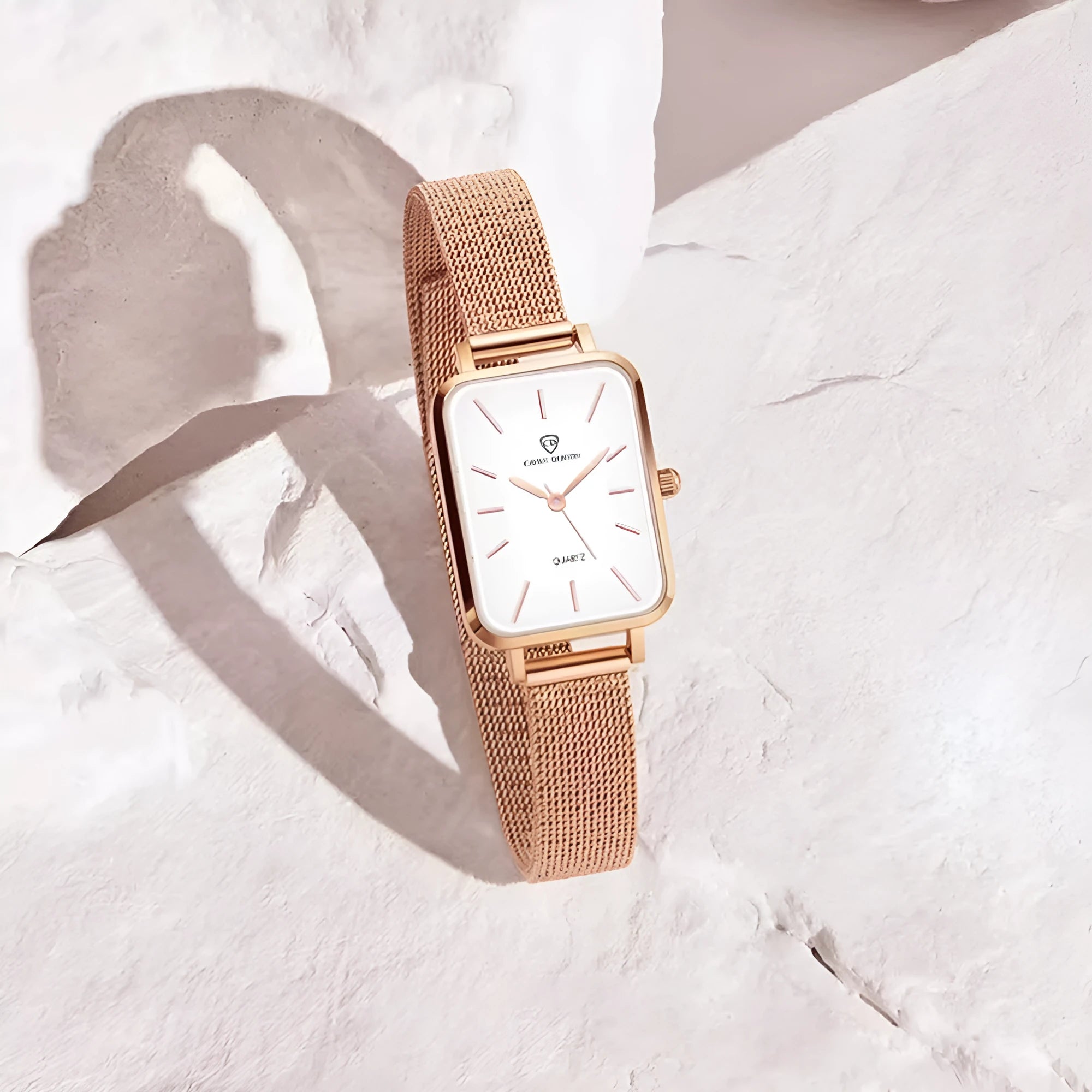 Women's waterproof quartz watch with woven steel strap in silver or rose gold colour options