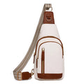 Soft brown women's crossbody chest bag showing zip compartments and street-style sewing thread detail