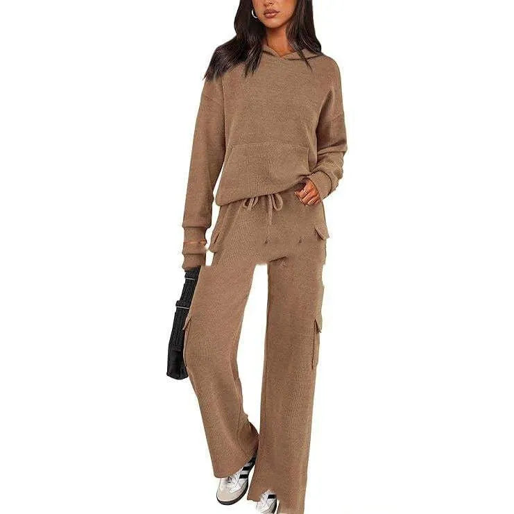 Women's polyester leisure sports suit set showing long sleeve top and matching trousers in multiple colour options