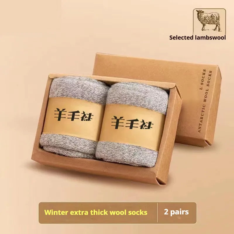 Pair of thick cotton winter socks in a solid colour, presented in a box.