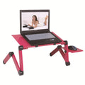 Folding computer desk with metal frame shown in black colour with cooling fans and mouse board accessory