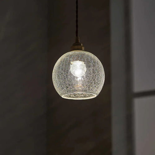 Brass chandelier with glass ball shades measuring 17.5cm wide, showing electroplated copper construction