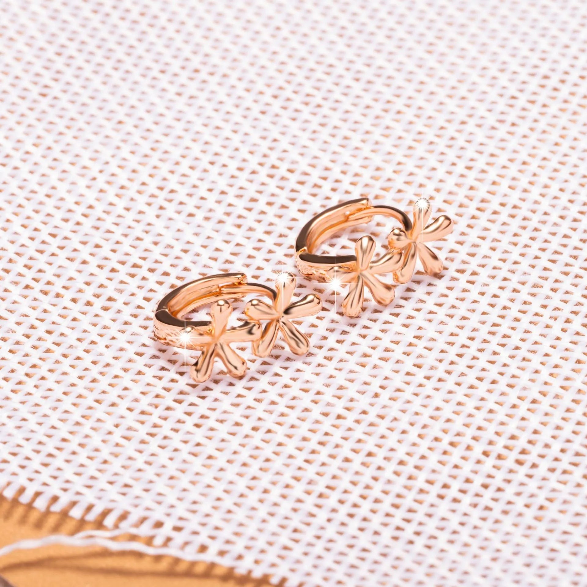 Electroplated rose gold waterdrop flower earrings with circular design for women