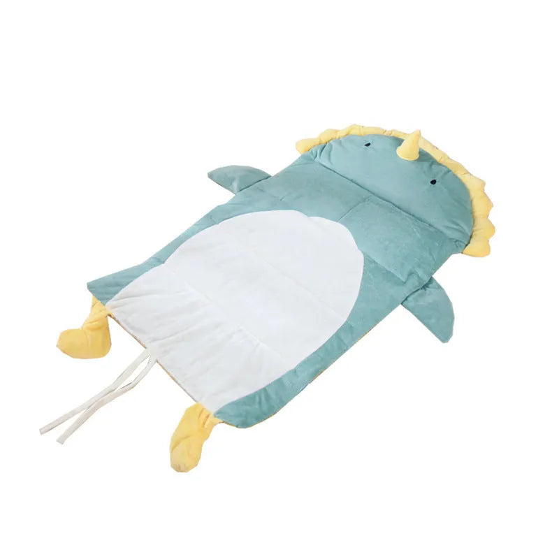 Detachable cool cat bed with ice pad in Green Dinosaur pattern on a indoor surface