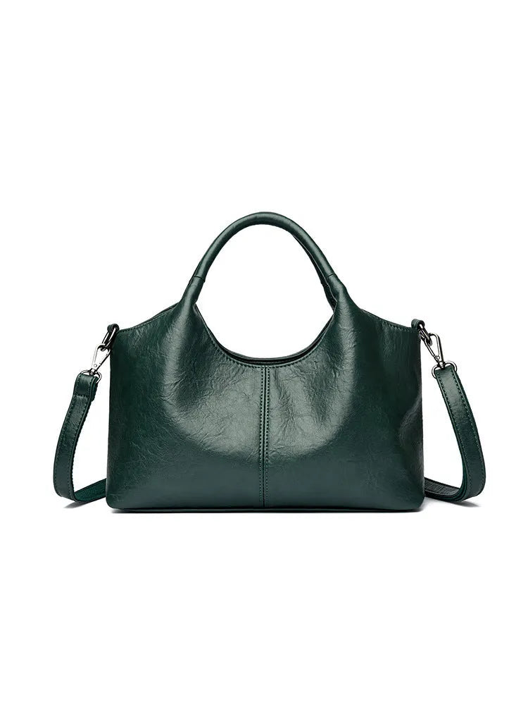 Genuine leather women's cross-body bag in black with soft texture and large capacity design