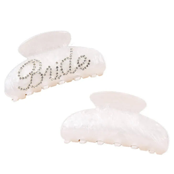 Acrylic hair barrette with sparkling diamond spot drills and English letters in pink or white.
