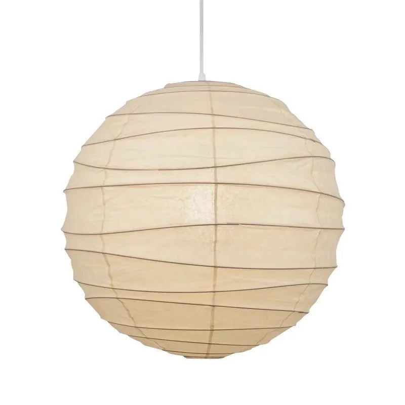Japanese rice paper pendant chandelier with soft white shade in a living room setting.
