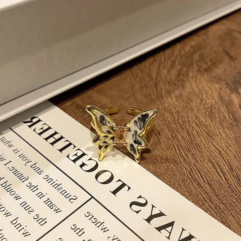 Copper Chinese butterfly women's ring showing creative design with oil dripping treatment finish