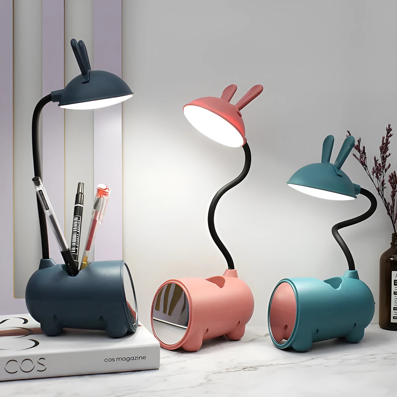 Cartoon-style USB table lamp with pen storage compartment in green colour
