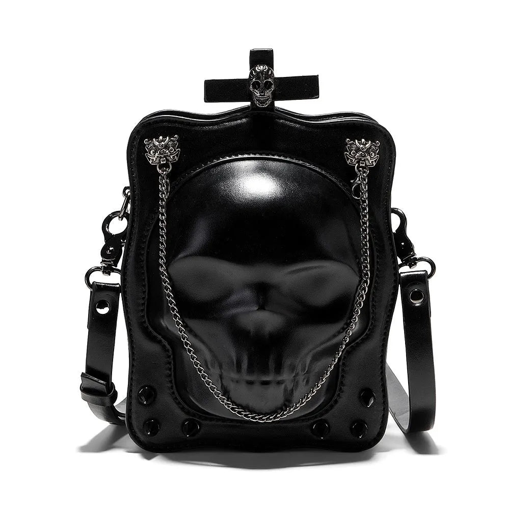 Black Gothic skull crossbody bag with square shape, chain detail, and zipper opening