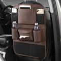 Genuine leather car seat back storage bag shown in grey, suspended behind a car headrest.