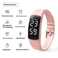 Black vibration alarm smart watch with LED display on a silicone strap, showing 50m waterproof rating.