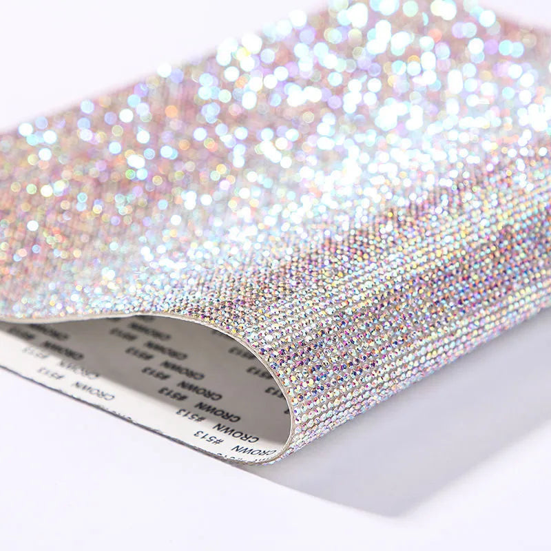 Rhinestone adhesive sheet with eight-eye pattern in multiple colour options on white background