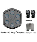 Black smart boxing machine with Bluetooth connectivity and included gloves on flat surface