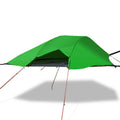 Self-driving tour camping hammock tent with aluminium pole and mosquito net suspended between trees in a forest setting