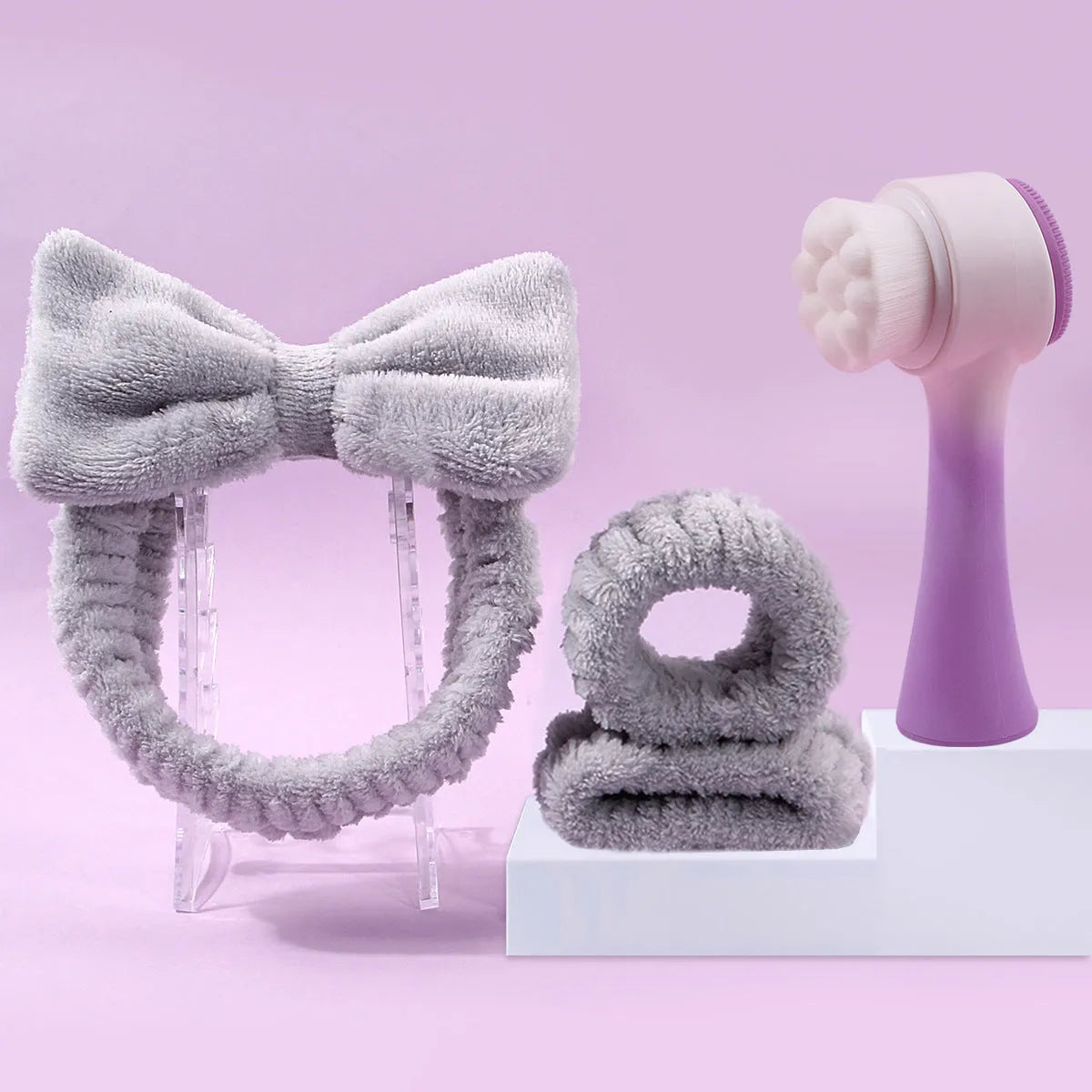 Facial brush set with coral fleece hair band, nylon bristle brush, and plastic toothbrush in purple, grey, white, or pink colours