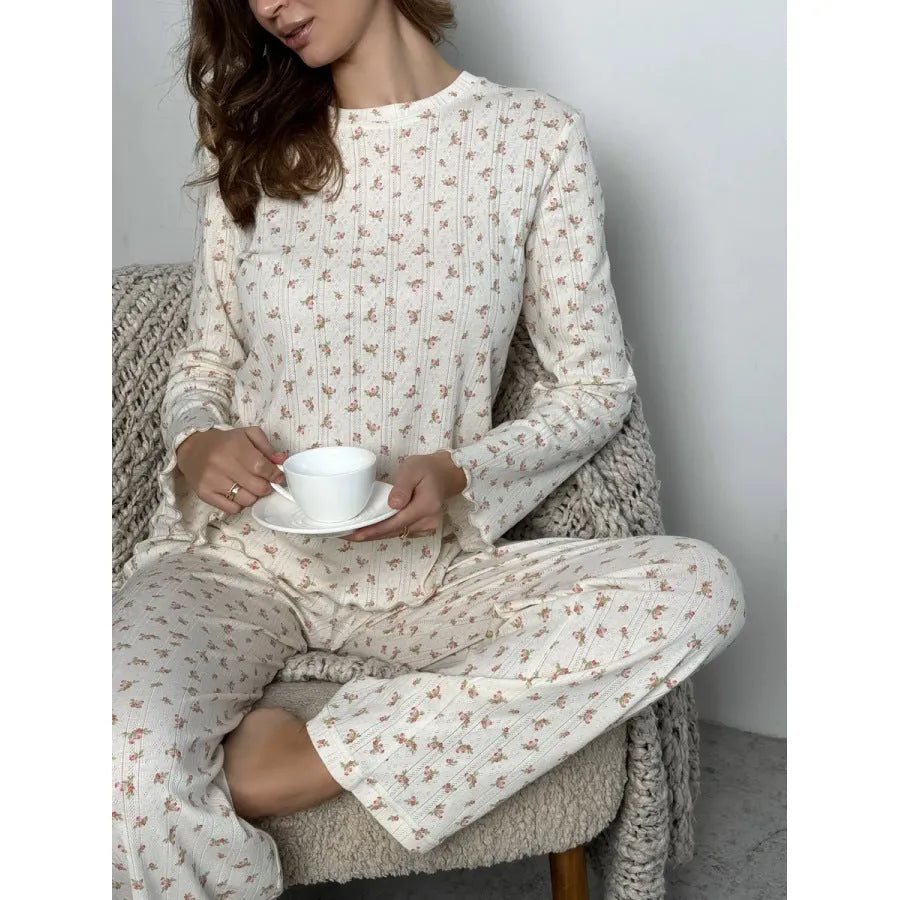 White floral print women's lounge set with bell sleeve top and wide leg trousers