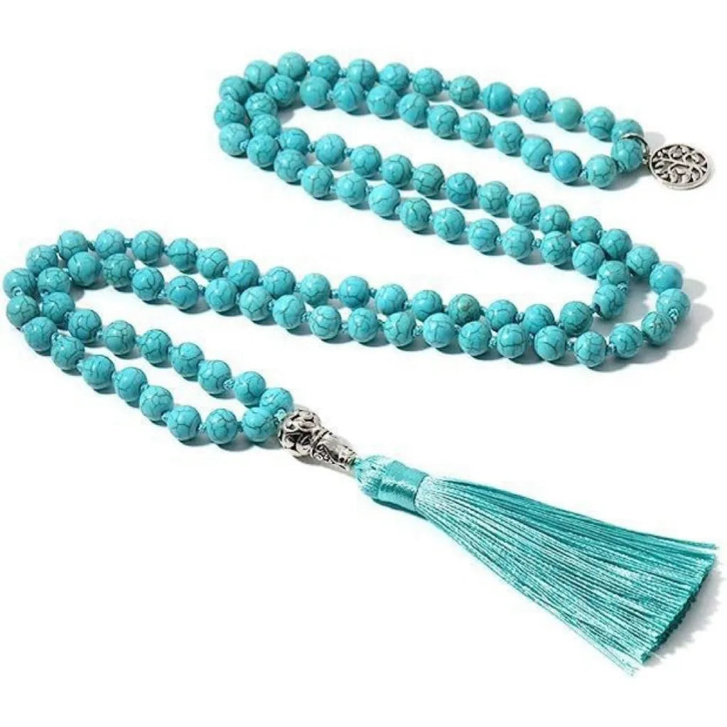 Handmade knotted beaded necklace with stone pendant showing 108 beads and geometric design