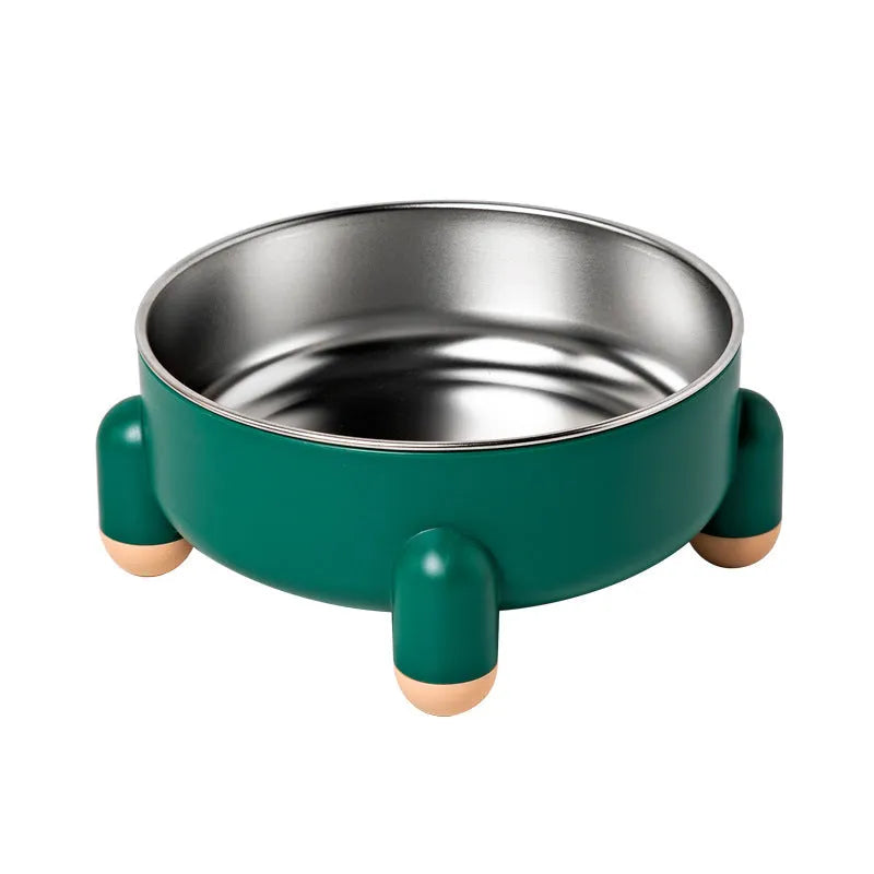 Green stainless steel pet bowl with non-slip base and high foot design on a wooden floor