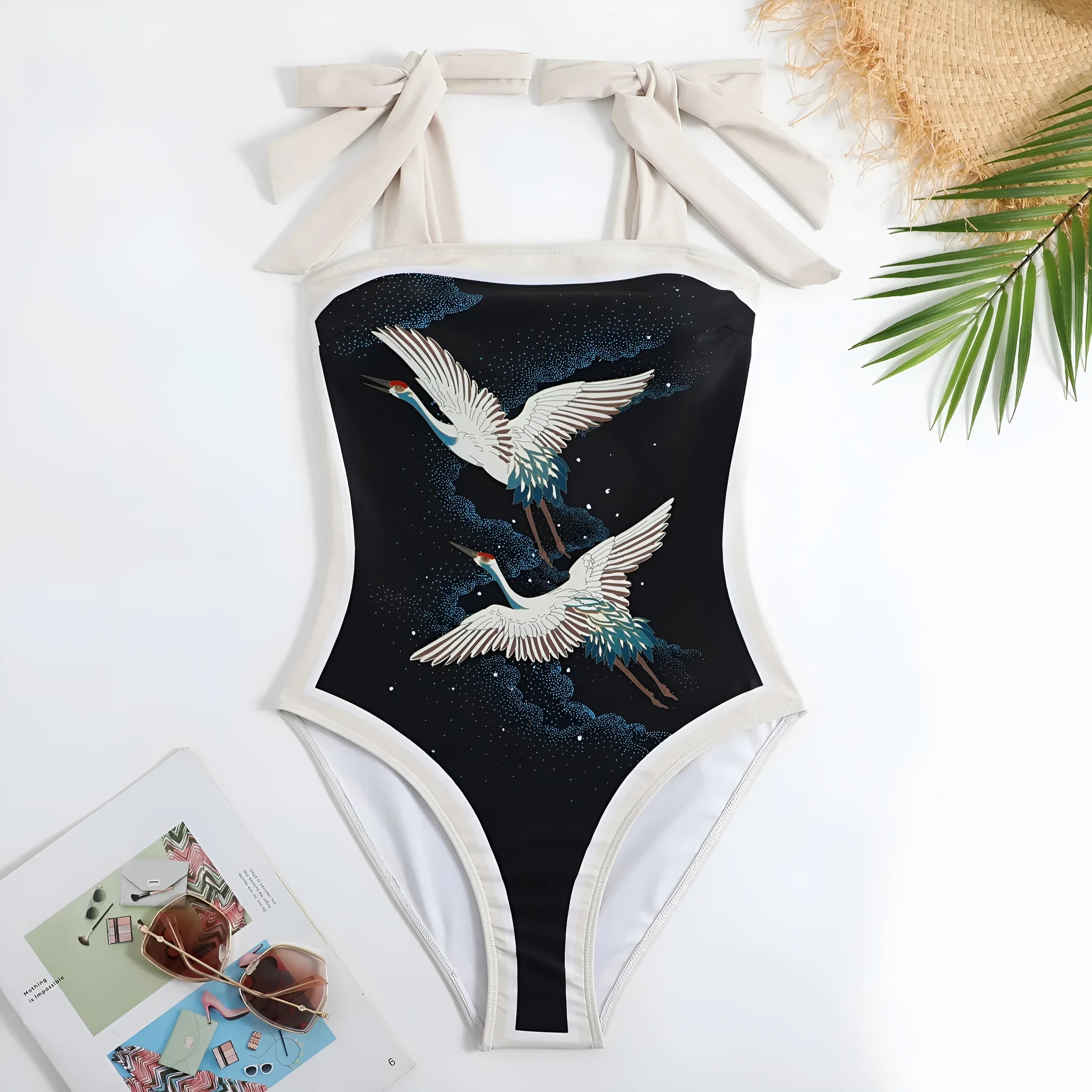 Women's yellow one-piece swimsuit with floral pattern and matching white chiffon skirt.