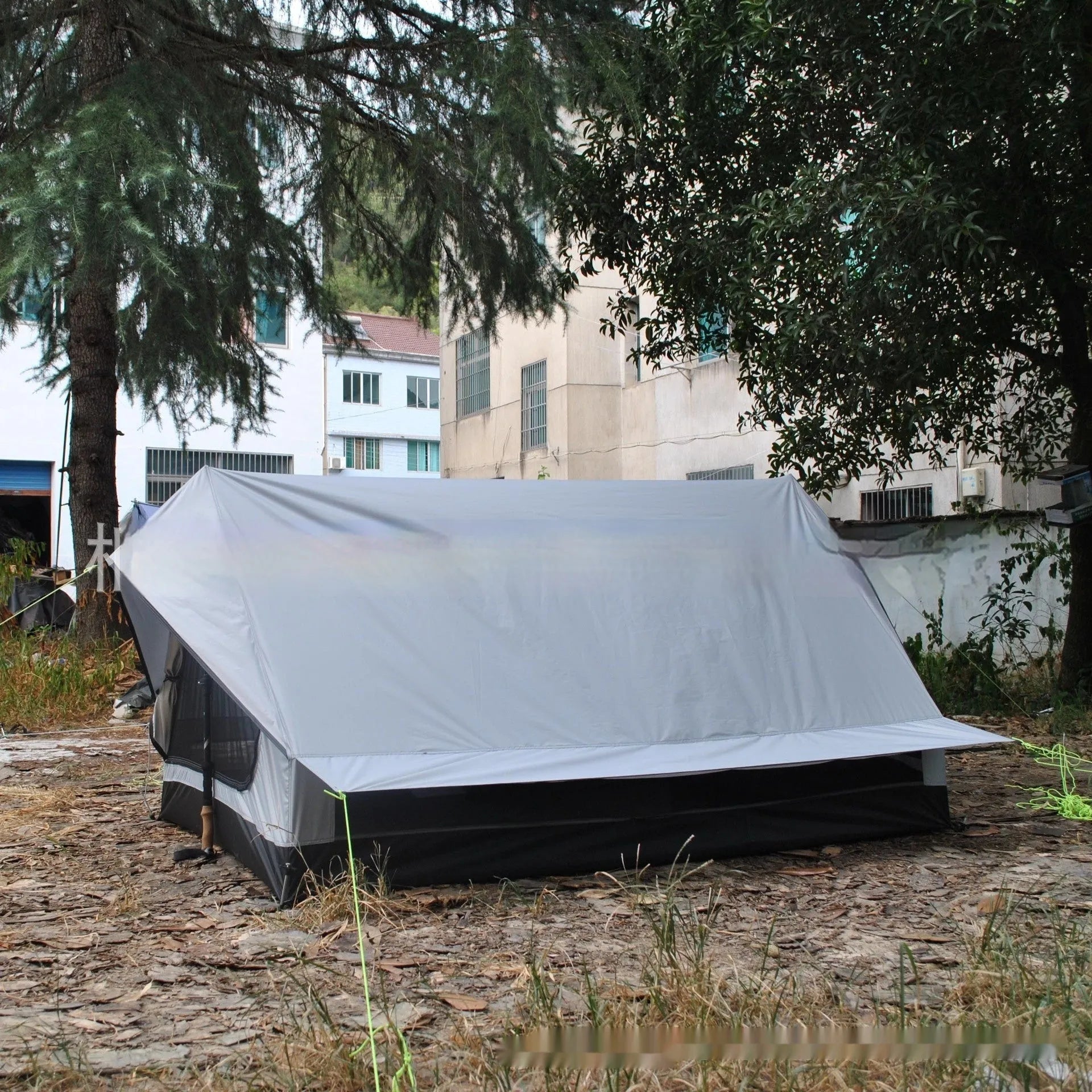 Brown or white A-line pole-free cabin tent for 2-3 people with hiking cane support