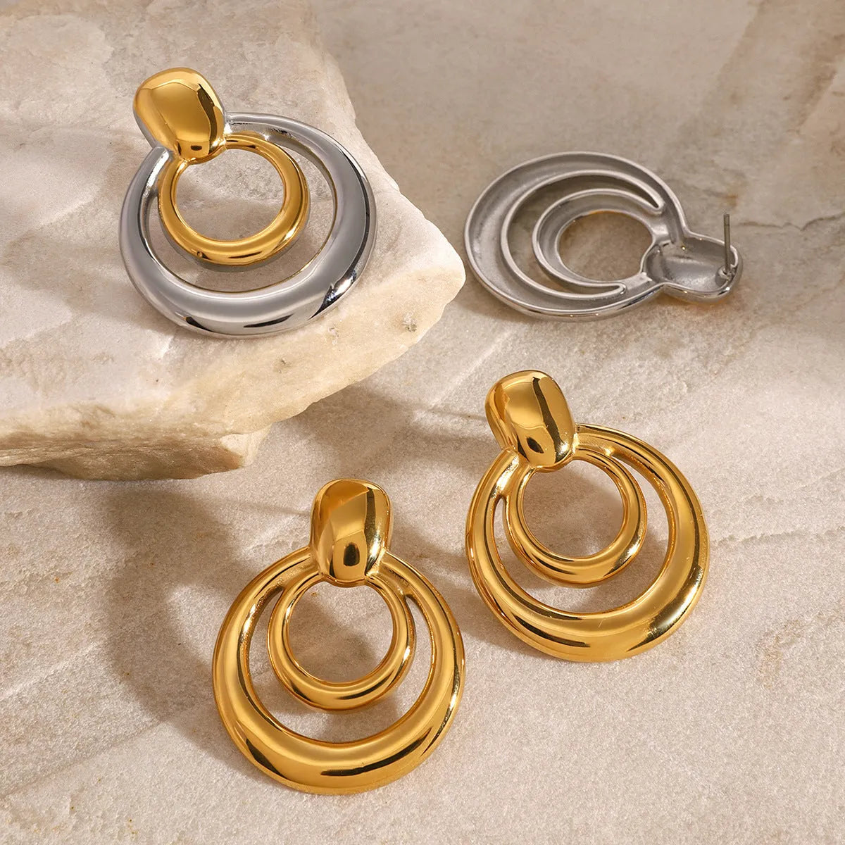 Golden round double-layer hollow stud earrings with geometric design and 18K gold plating