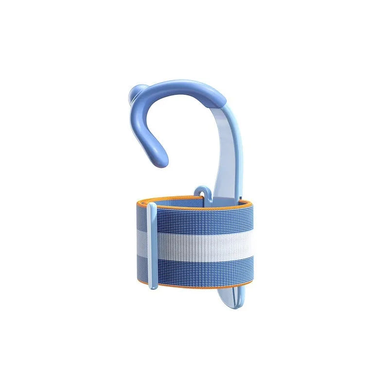 Blue anti-hook wrist brace and pen control corrector for children's writing posture on a table.