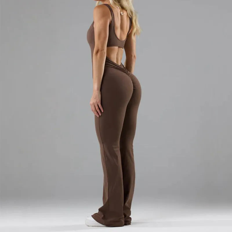 Women's black yoga bodysuit with hollow seam design and built-in chest pads