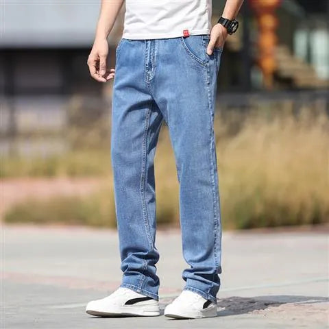 Men's smoky grey autumn jeans with straight tube fit and low waist design on hanger
