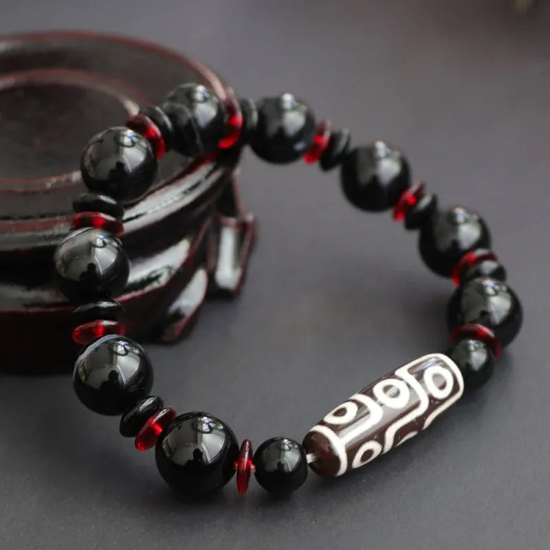 Black agate Dzi bead bracelet with hand-woven treatment and geometric national style design