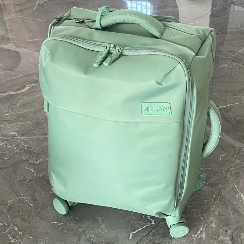 Ultra-light waterproof Oxford cloth suitcase with universal wheels in bluestone green colour