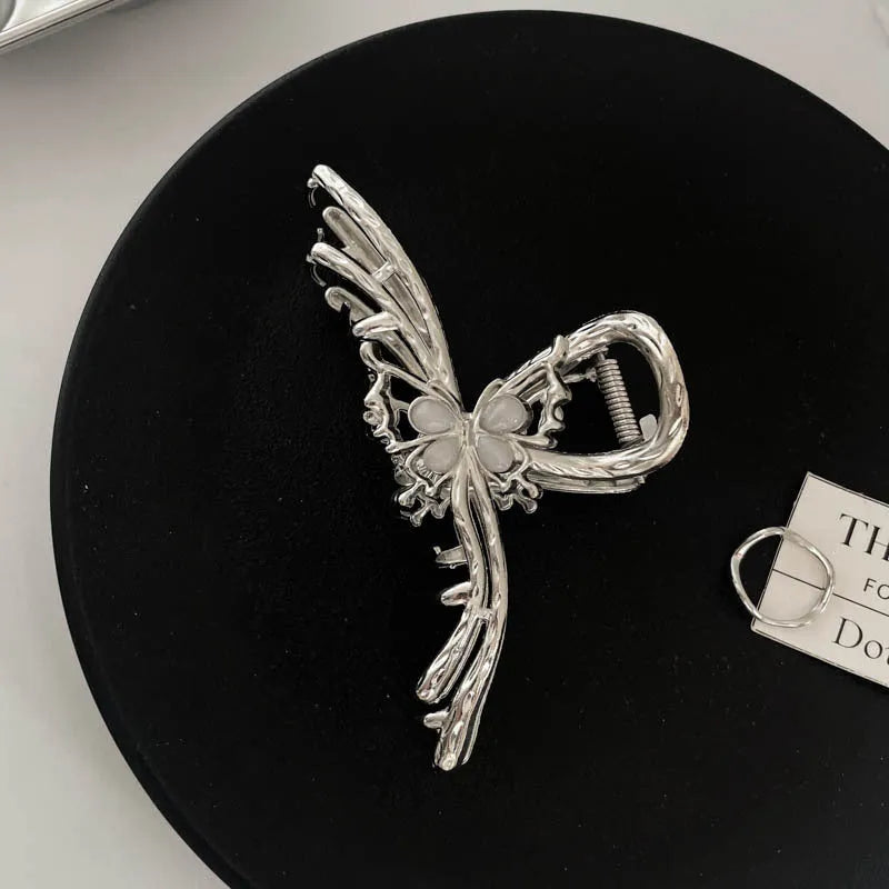 Silver metal hair barrette claw clip with electroplated finish and decorative design