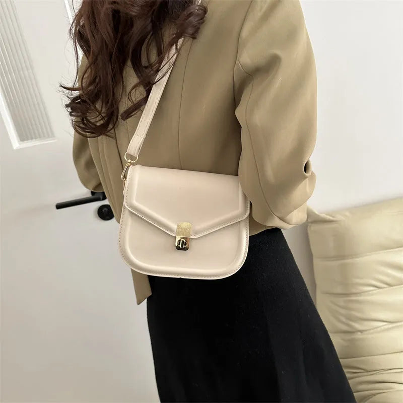 Soft PU leather clamshell messenger bag in horizontal square shape showing four colour options