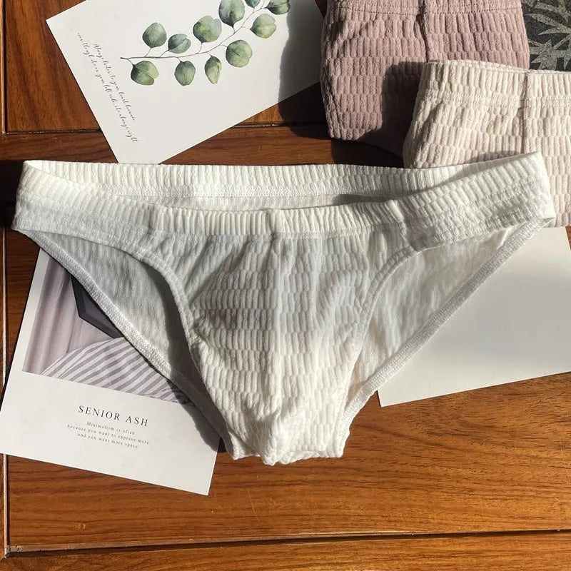 Men's cotton briefs in solid colours showing mid waist and triangle design