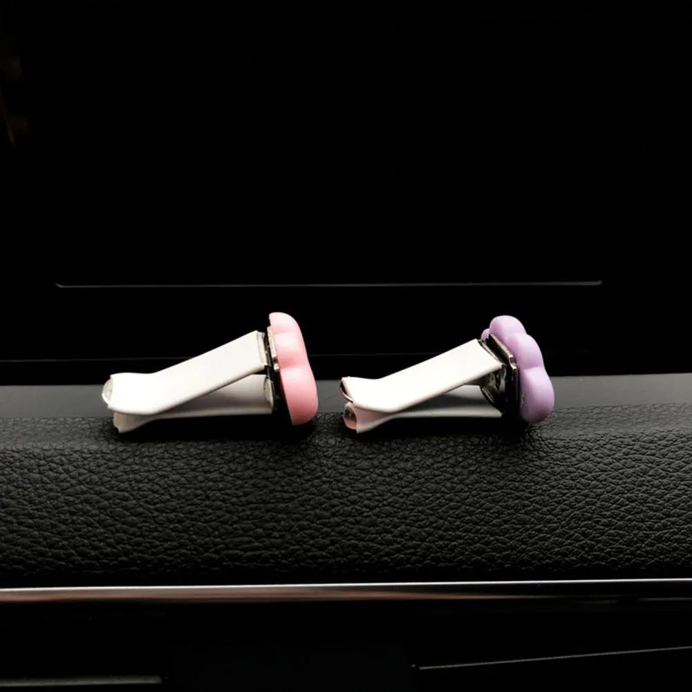 Baiyun cartoon design resin car fragrance clip for air vents in assorted colours.