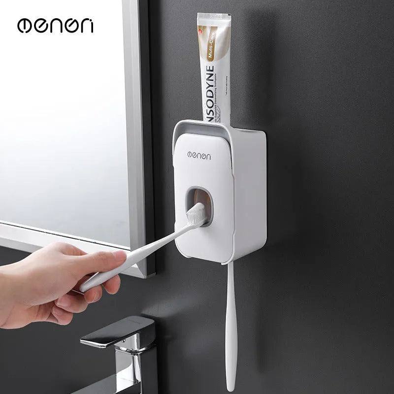 Wall-mounted automatic toothpaste dispenser in blue colour with touch sensor.
