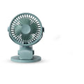 USB mini clip fan in white with 165mm fan head clamped onto a desk edge